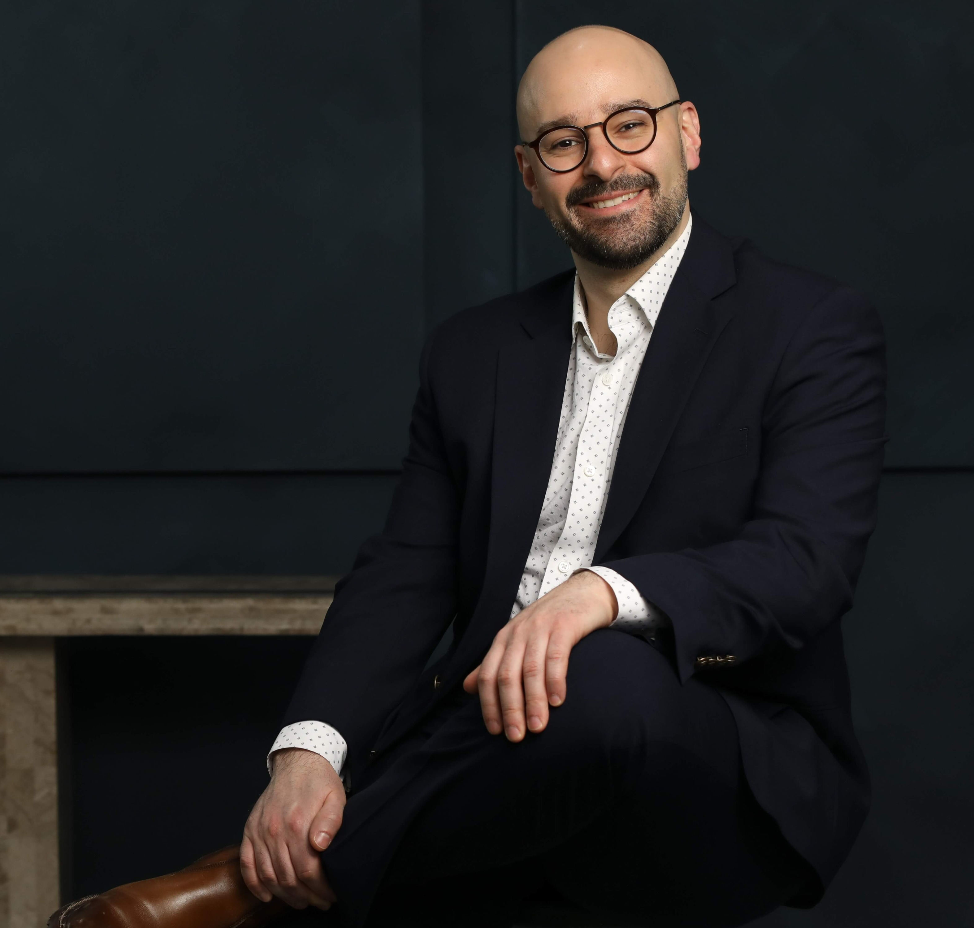 Dr. Motaz Alshami, seated