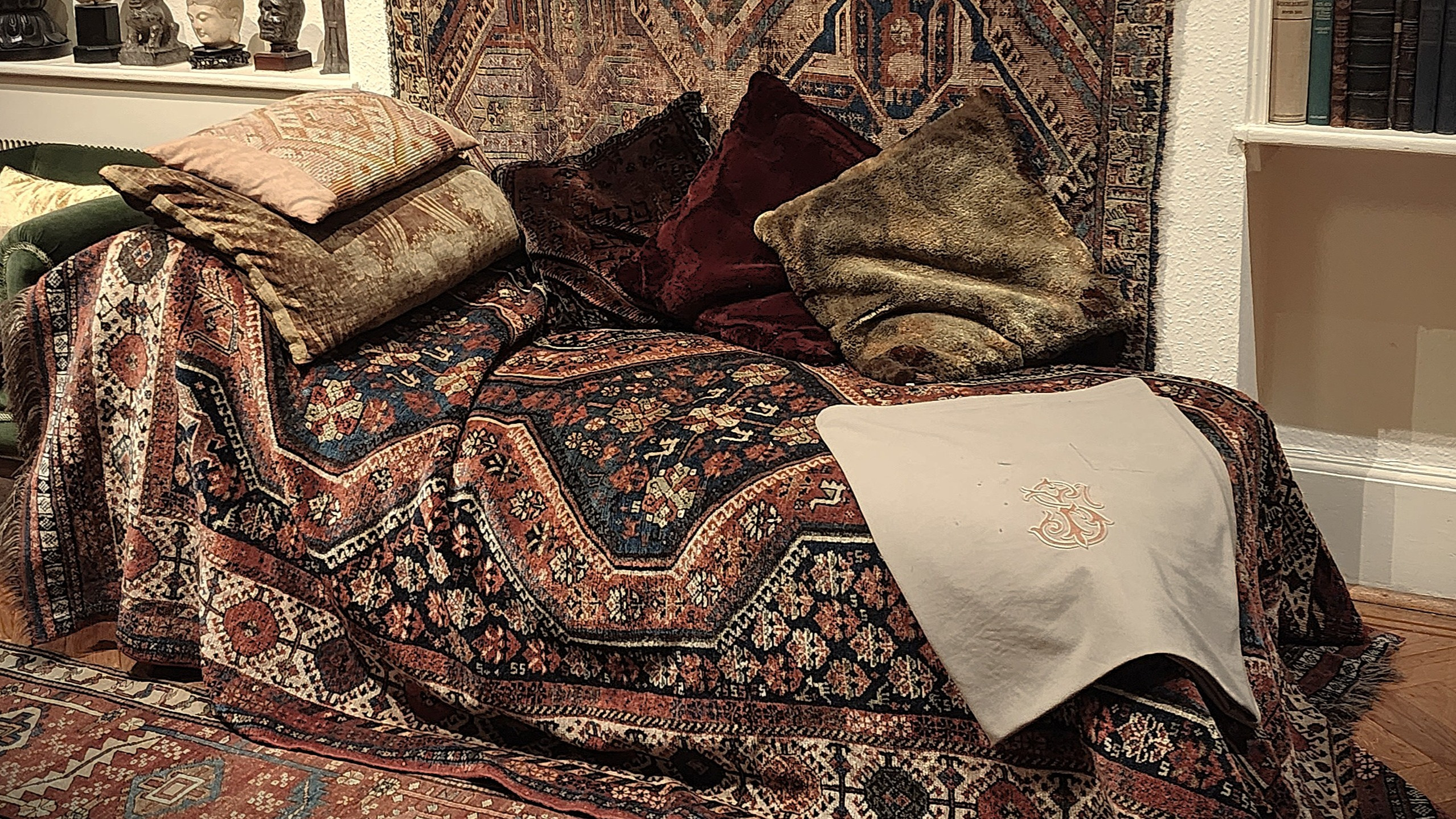 Freud's couch, similar to the couch one would lie down on during psychoanalysis or psychotherapy with Dr. Alshami in Chicago to serve your mental health needs